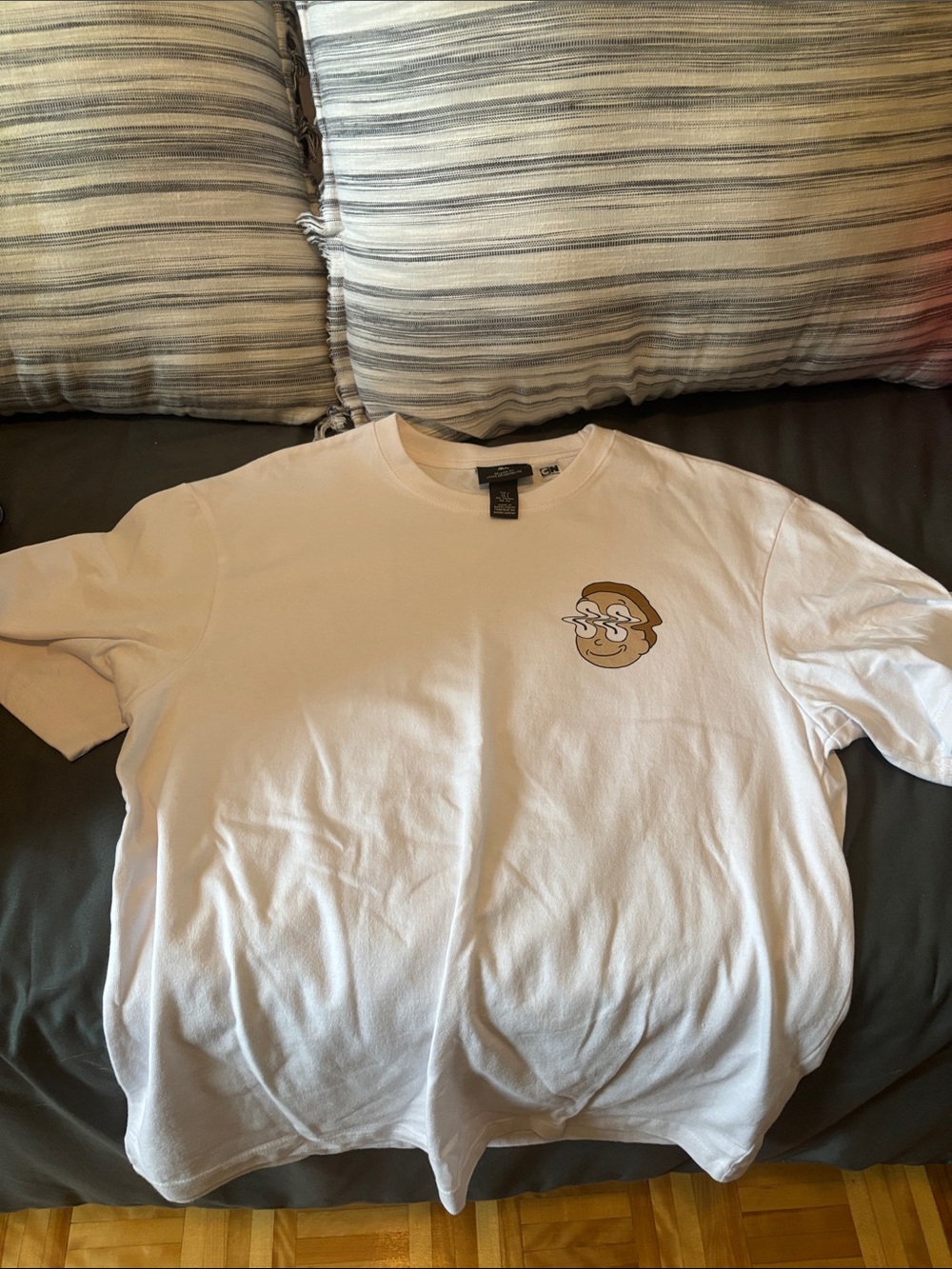 H&M White Short-Sleeve Tee with Small Brown Cartoon Face